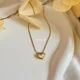 Gold Cupid Heart Necklace -Reversible