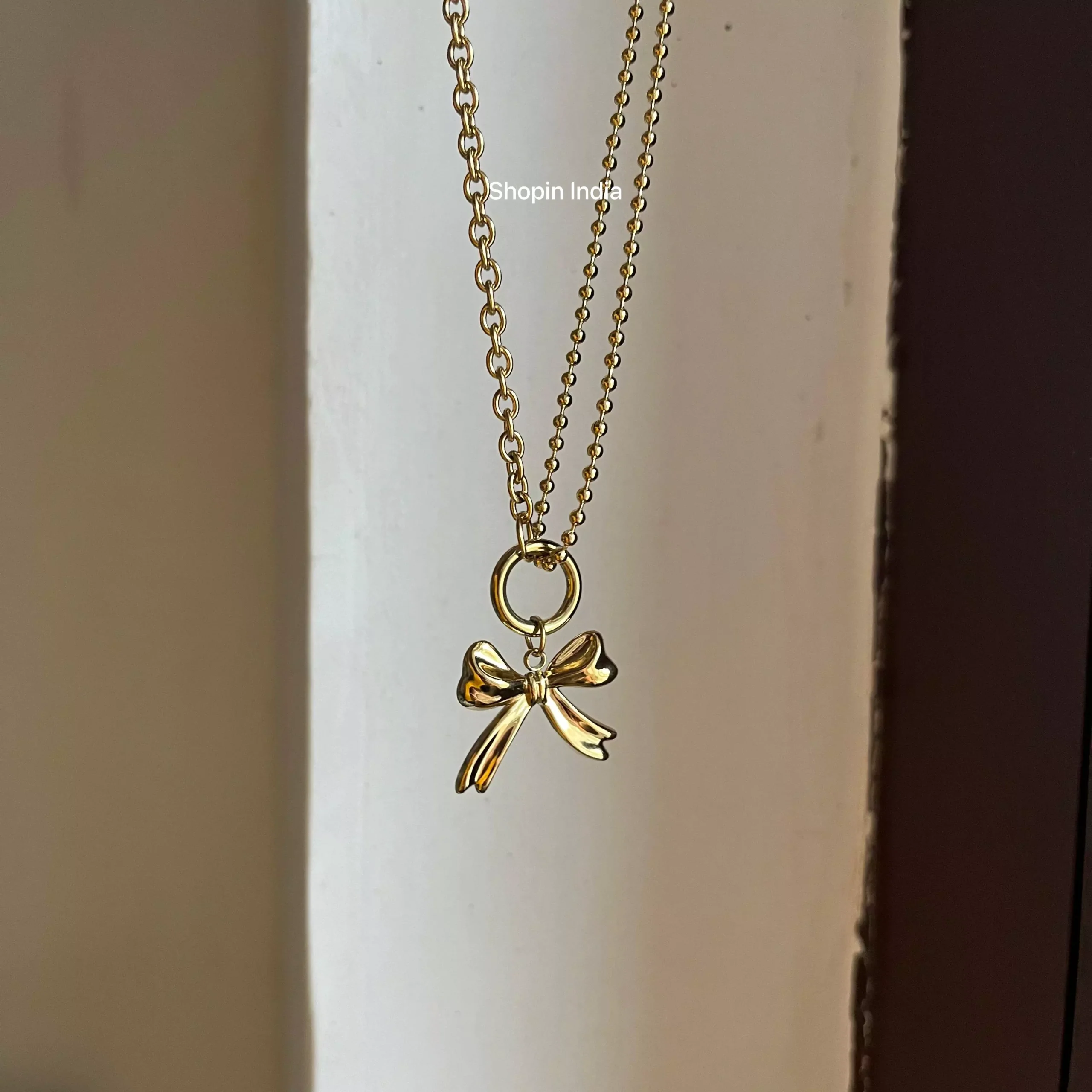Brezza Bow Linked Necklace